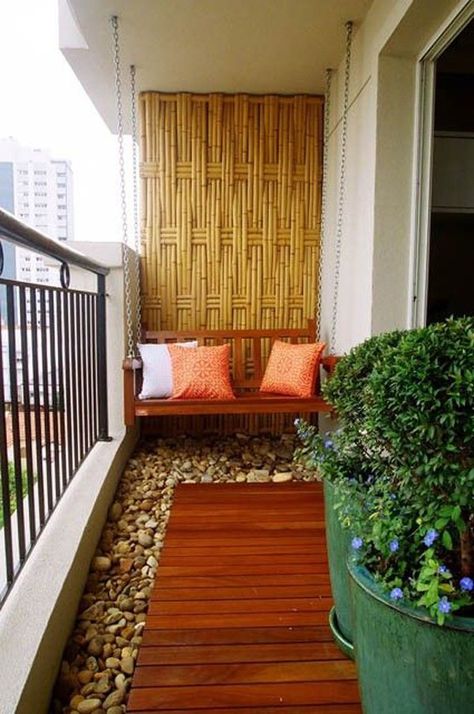 Bamboo inspired walls aren’t only great to look at but they also help make your surroundings seem fresh and cool. Add smooth white pebbles as your carpet and potted plants and you will be feeling the cool fresh air blowing straight from your balcony. Klein Balkon Decor, Balcon Mic, Condo Balcony, Balkon Decor, Tiny Balcony, Balcony Design Ideas, Balcony Flooring, Small Balcony Garden, Small Balcony Design