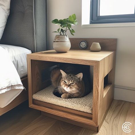 The Cat Scratching Post Bedside Table combines functionality and style. Featuring a built-in scratching post inside the table, it offers a discreet and durable solution for your cat’s scratching needs. The tabletop is perfect for holding a lamp, books, or other essentials, seamlessly fitting into any bedroom decor while keeping your cat entertained and your furniture protected. Conceptual AI Art Follow @ecosapiens for more! Cat Aesthetic Furniture, Cat End Table, Nightstand Cat Bed, Cat Bedroom Pets, Cats Scratching Furniture, Cat Bedside Table, Aesthetic Cat Corner, Catified Bedroom, Cat Nightstand