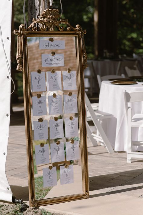 20+ Stylish Mirror Wedding Table Plan Ideas Gold Frames Table Numbers, Seating Chart Picture Frame Diy, Mirror With Table Numbers, Table Numbers On Mirror, Table Seating On Mirror, Floor Mirror Seating Chart, Table Numbers Wedding Mirror, Mirror Seating Chart With Wax Seals, Mirror Wax Seal Seating Chart