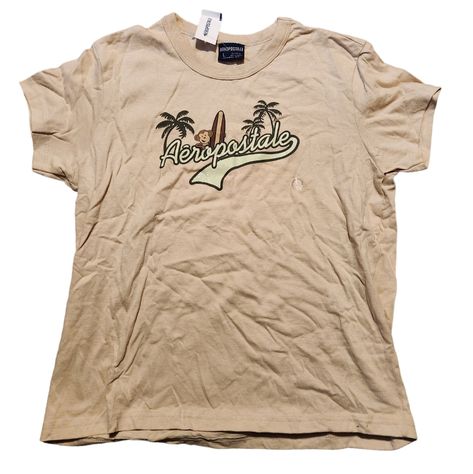 Nwt Vintage Y2k Aeropostale Women's T-Shirt Size Large Tomboy Fit Light Tan With Monkey And Surfboard, And Aeropostale In Glitter On Front Pit To Pit: 20 1/2" Length: 21" 100% Cotton This Is A Super Cute Shirt! Smoke-Free And Pet-Free Home Offers Welcome! Bundle And Save! Fast Shipping! 5-Star Seller! Aeropostale Outfits, Poshmark Clothes, Tomboy Fits, Tomboy Shirts, Vintage Aeropostale, Aeropostale Shirt, Y2k Aeropostale, Clothes Board, White Lace Tank Top