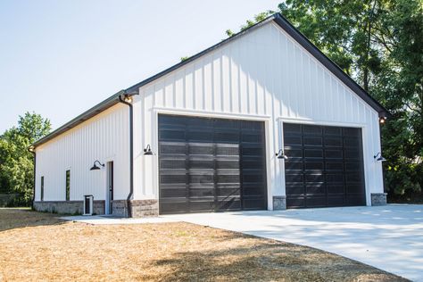 Farmhouse With Detached Shop, Modern Farmhouse With Detached Garage, Garage Ideas Exterior Detached, Detached Garage Designs Exterior, Huge Garage Ideas, Detached Shop Garage, White Garage With Black Doors, Metal Garage Buildings Ideas, White Metal Building With Black Trim