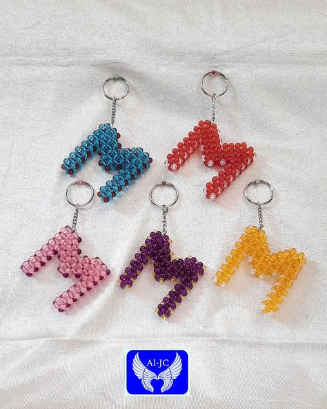 Beaded alphabet keychains are charming and functional accessories featuring individual letters crafted from colorful beads. *Personalization:* Customize your keys with your initials or spell out your name for a unique touch. *Gifts:* They make thoughtful, personalized gifts for friends, family, or colleagues. *Bag Accessories:* Attach them to your bag zipper or strap for added style and easy identification. *School Backpacks:* Ideal for students to add personality to their backpacks a... Spell Out Your Name, Touch Gifts, Personalized Gifts For Friends, Alphabet Charms, Personalised Gifts For Friends, Alphabet Beads, Letter A Crafts, Add Personality, Functional Accessories