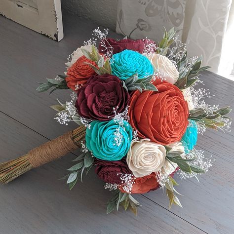 "Please Read Entire Description Before Purchase Bouquet with sola wood flowers in burnt orange, burgundy, teal green, and ivory, with baby's breath and faux greenery. Flower styles can and will vary based on current inventory levels and to keep orders unique, so they are not exact duplicates. Please include your choice of stem wrap and color (color of ribbon, white or ivory lace, or twine) in the notes section. Size pictured is a medium (approximately 8\" in diameter).  Bouquets listed in the Et Jade And Burgundy Wedding, Fall Wedding Bouquets Teal, Teal And Copper Wedding Bouquets, Teal Burgundy Orange Wedding, Teal And Burnt Orange Bouquet, Teal Burnt Orange And Burgundy Wedding, Turquoise And Burgundy Wedding, Burnt Orange And Turquoise Wedding, Turquoise And Burnt Orange Wedding