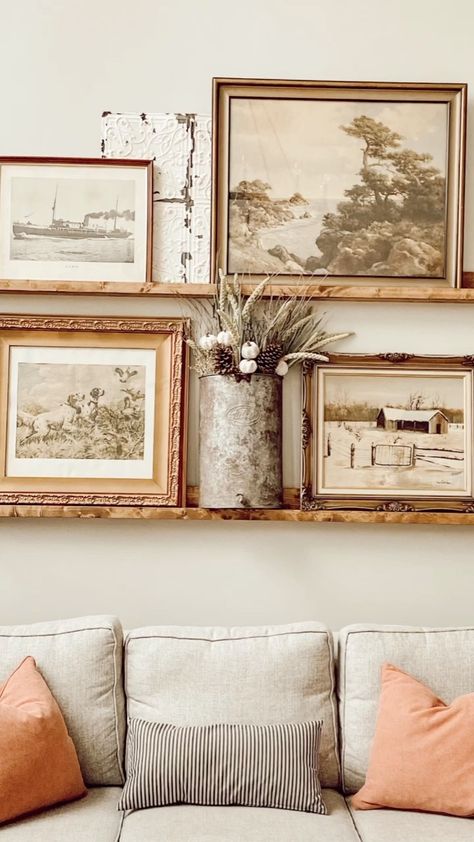 Styling Above A Couch, Behind Couch Wall Decor Vintage, Over Sectional Couch Wall Decor, Picture Collage Over Couch, Art For Behind The Couch, Living Room Floating Shelves Above Couch With Mirror, Simple Above Couch Decor, Art Above Sectional Couch, Gallery Shelf Above Couch