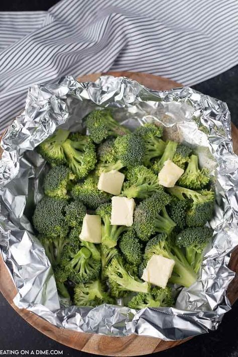 You will love how easy this Grilled Broccoli Side Dish recipe is. The entire family will love this easy grilled broccoli recipe! It's packed with flavor! This is the easiest side dish recipe with only 4 ingredients and clean up is easy too since it’s made in a foil packet! #eatingonadime #grillingrecipes #sidedishrecipes Grill Broccoli, Bbq Broccoli, Brocolini Recipes, Cheesey Broccoli, Cooking Fresh Broccoli, Grilled Foil Packets, Grilled Green Beans, Broccoli Recipes Side Dish, Grilled Broccolini