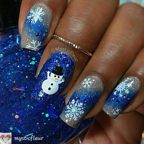 By #mysticfleur #xmasnailart #prettynailart #christmasnails #snowman#naildesigns#winternails #holidaynails#nailartist#naildesign #nailinspiration #nailartdesigns #nailartideas #nailworld #nailpictures #naturalnails Hanukkah Nail Art, Overlay Christmas Nails, Blue Snowman Nails, Christmas Nails Dark Blue, Christmas Nails Blue And Silver, Winter Nail Art Snowflakes, Xmas Nails Blue, Blue And Silver Christmas Nails, Snowman Nails Design