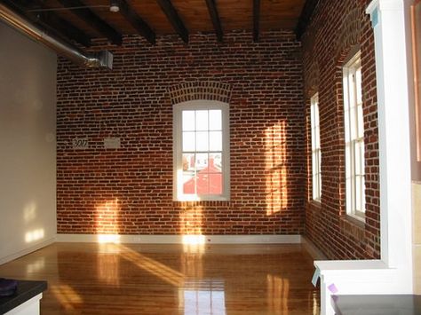 I SO want a brick wall in my apartment.... Small Brick Apartment, Apartment Brick Wall, Uptown Apartment, Brick Apartment Interior, Nyc Brick Apartment, Red Brick Apartment, Brick Studio Apartment, Brick Wall Studio, Brick Wall Room