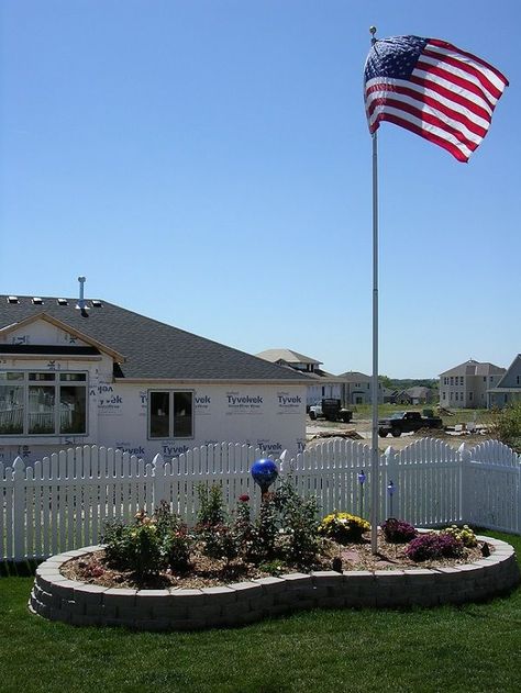 Front Yard Flag Pole Ideas, Flag Pole Landscaping Front Yards, Flagpole Ideas, Flagpole Landscaping, Small Raised Garden, Flag Pole Landscaping, Pink Porch, Flagpole Landscaping Ideas, Shore Landscape