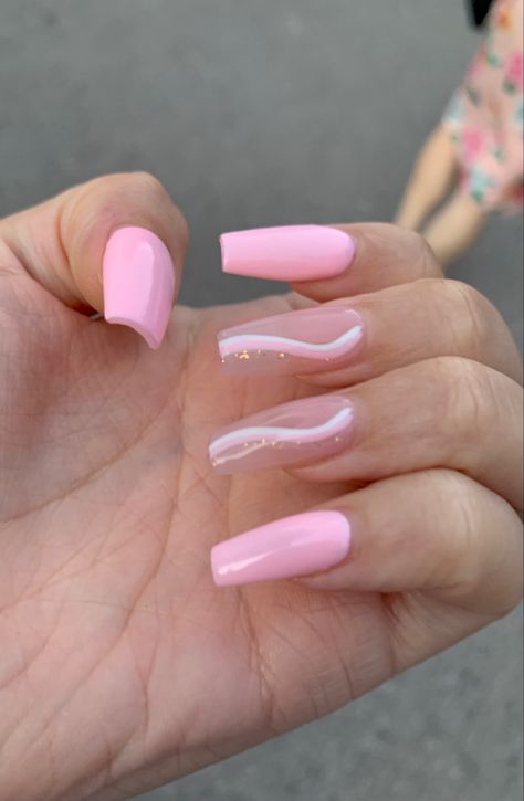 Baby pink spring nails with a beautiful design on the middle and ring finger. Ring Finger Design, Summer Nails Pink, Pink Spring Nails, Nails Sparkly, Acrylic Nail Designs Coffin, Pink Summer Nails, Ring Finger Nails, Baby Pink Nails, Solid Color Nails