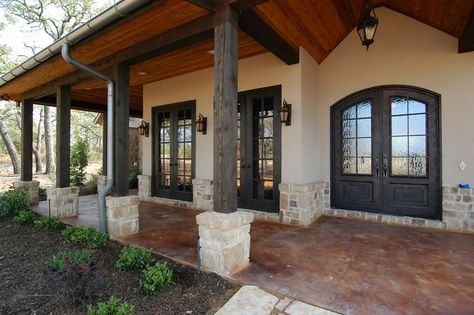 View our photo gallery featuring home exteriors.  Creating beautiful, energy efficient custom homes and custom home editions in the Dallas, TX area. Rock Porch Columns, Stone Ideas For Front Of House, Metal Porch Columns, Exterior Stucco, Front Porch Stone, Hill Country Homes, Building A Porch, Stucco Homes, Stone Pillars