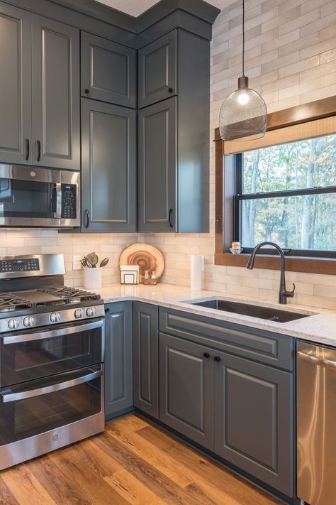 Dark Gray Kitchen Cabinets Beige Kitchen Backsplash Dark Cabinets Hardwood Floors Black Hardware Dark Gray Kitchen Cabinets With Black Hardware, Dark Gray Cabinets With White Countertops, Grey Backsplash Kitchen Brown Cabinets, Dark Grey Cabinets Black Hardware, Kitchen Ideas Hardwood Floors, Dark Gray Cabinets With Black Hardware, Painted Kitchen Cabinets With Dark Wood Floors, Dark Cabinets And Light Countertops, U Shaped Kitchen Dark Cabinets