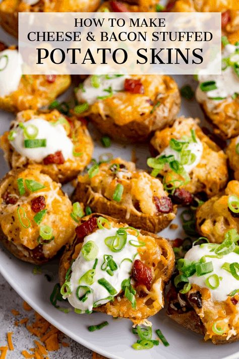 Creamy cheesy fluffy potatoes with crispy bacon - all baked in a crunchy potato skin. These Stuffed Potato Skins are serious comfort food. #potatoskins #stuffedpotatoes #loadedpotatoes #stuffedpotatoskins #gamedayfood #fingerfood Potato Skins Vegetarian, Fluffy Potatoes, Stuffed Potato Skins, Gameday Appetizers, Potato Skins Recipe, Buttery Potatoes, Baked Potato Skins, Potatoe Skins Recipe, Stuffed Potato