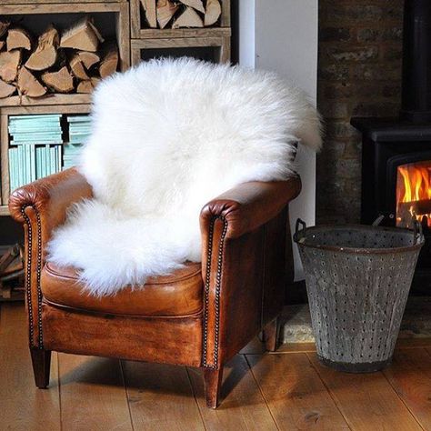 20 Unexpected Ways To Use Sheepskin | Domino Mid Century Leather Chair, White Leather Chair, Sheepskin Chair, Best Leather Sofa, Nursery Chair, Chair Makeover, Couch Set, Leather Couch, White Chair