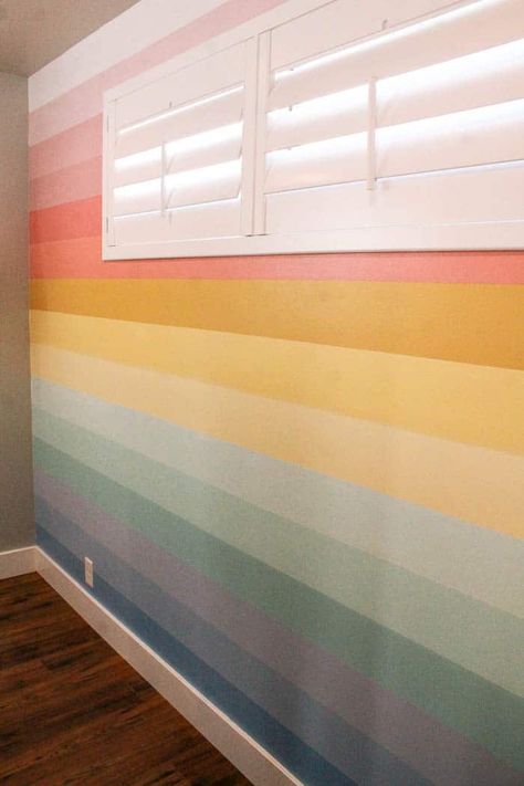 horse inspired girl room with a rainbow mural. Ideas and decor that kids will love. Plus an easy diy for painting a striped and colorful pastel featured wall to get a bedroom to match your aesthetic. Rainbow Mural Bedroom, Rainbow Painted Walls Kids Rooms, Girls Bedroom Wall Paint Ideas, Stormy Bedroom, Rainbow Shiplap Wall, Bedroom Wall Paint Ideas, Easy Mural Ideas Diy, Bedroom Wall Color Ideas, Girls Bedroom Wall Color