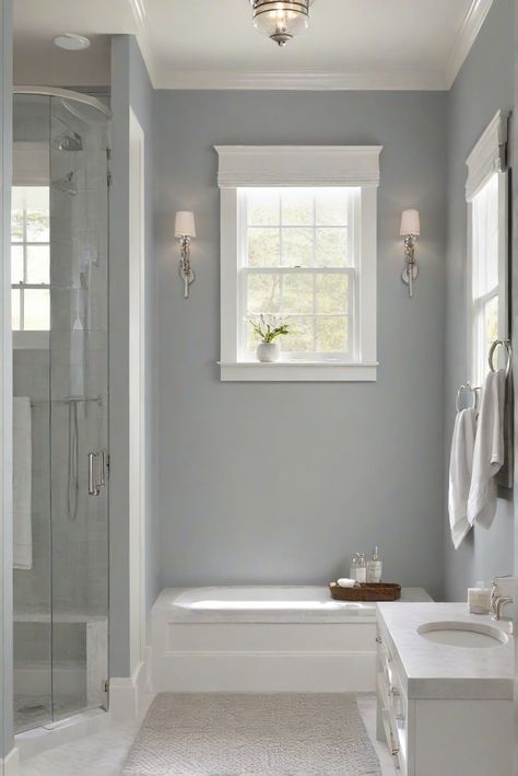 Step into a tranquil bathroom haven with the subtle sophistication of BM Boothbay Gray (HC-165). Discover the daily routine of an interior designer and explore decor ideas for a serene space. #Ad #homedecor #homedesign #bathroom #Painthome interiorarchitecture best Wall Colors for Bathroom Colors Bright Room Colors best colors combinations bathroom bathroom Remodeling Modern Paint Colors 2024 Boothbay Gray Bathroom, Bm Gray Wisp, Small Bathroom Colors Paint, Bm Boothbay Gray, Bathroom Paint Colors Benjamin Moore, Benjamin Moore Bathroom Colors, Bathroom Paint Colors Sherwin Williams, Bathroom Paint Colors Blue, Boothbay Gray