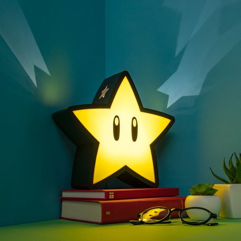 A Super Mario–inspired projector light you can count on to leave you *starry-eyed* whether you're nodding off or taking down all your friends in Mario Kart. Bedside Ideas, Mario Super Star, Nintendo Decor, Mario Room, Mario Star, Super Mario Games, Mushroom Lights, Super Mario 3d, Star Lamp