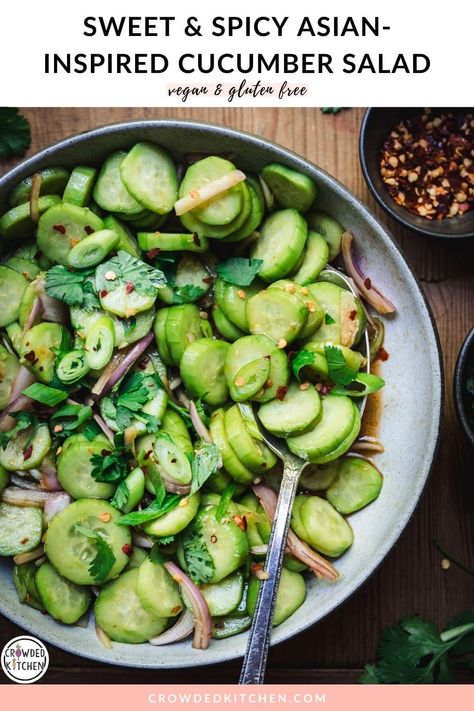 This refreshing Asian-inspired cucumber salad is cooling summer side dish. The dressing is a little spicy, salty and gingery, with a fresh garnish of cilantro and scallions. Summer Entrees, Spicy Cucumber Salad, Asian Inspired Salad, Crowded Kitchen, Asian Cucumber Salad, Yummy Salads, Cucumber Recipes Salad, Vegan Side Dishes, Cucumber Recipes