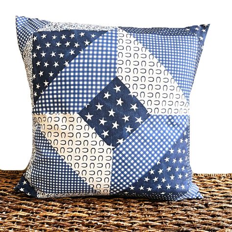 Fun pillow cover!   The front is repurposed from a Sur La Table cloth napkin. The pattern is patchwork look with stars, floral, horseshoes, gingham check in navy, cornflower blue and white. The back is a navy blue cotton fabric. It is the perfect accent for any room! Details** Pillow cover only    insert not included Size is 18 x 18 inches Seams are double stitched and overlocked Back has envelope closure for easy access Recommend spot clean Thanks for visiting!   Suzanne and Melissa To view mor Quilted Throw Pillow, Recycling Jeans, Patriotic Pillow, Fun Pillow, Quilted Throw, Blue Cotton Fabric, Room Details, Patchwork Pillow, Cloth Napkin