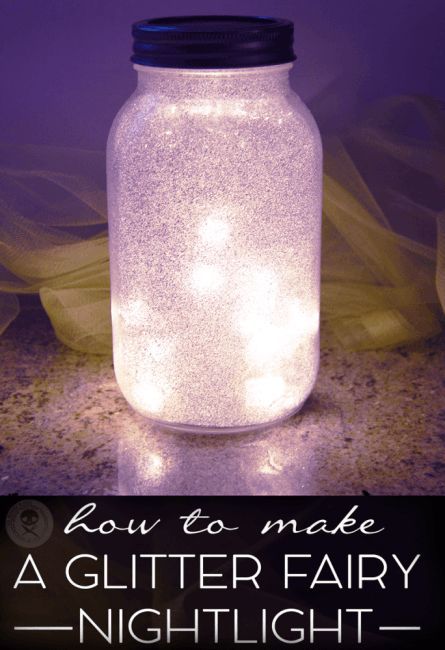 Make a fun and easy Glitter Fairy Light! Perfect for whimsical wedding decor or bedroom! It's so pretty and magical... Here’s what you need: 1 screw top jar (like a mason jar) – this can be plastic if desired. I got mine at Dollar Treespray craft adhesive1 ounce glitter in any color (I used silver)battery-operated LED string lights (like these)spray paint for the jar top (if desired)You can also use hot glue or epoxy to glue the battery pack to the inside of the lid. How pre… Easy Mason Jar Crafts Diy, Fairy Mason Jars, Mason Jar Fairy Lights, Easy Mason Jar Crafts, Fairy Night Light, Glitter Fairy, Diy Hanging Shelves, Mason Jar Projects, Fairy Jars