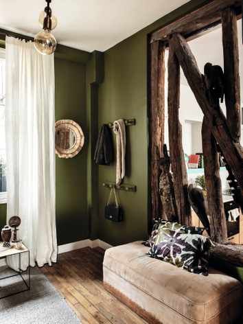 A collection of original beams acts as a divider between the entrance hall and the kitchen-diner, while retaining the sense of openness that Camille loves. Farrow Ball Bancha, Living Room Wall Color, Room Wall Colors, Living Room Color Schemes, Green Walls, Room Color Schemes, Brown Living Room, Living Room Green, Elegant Living Room