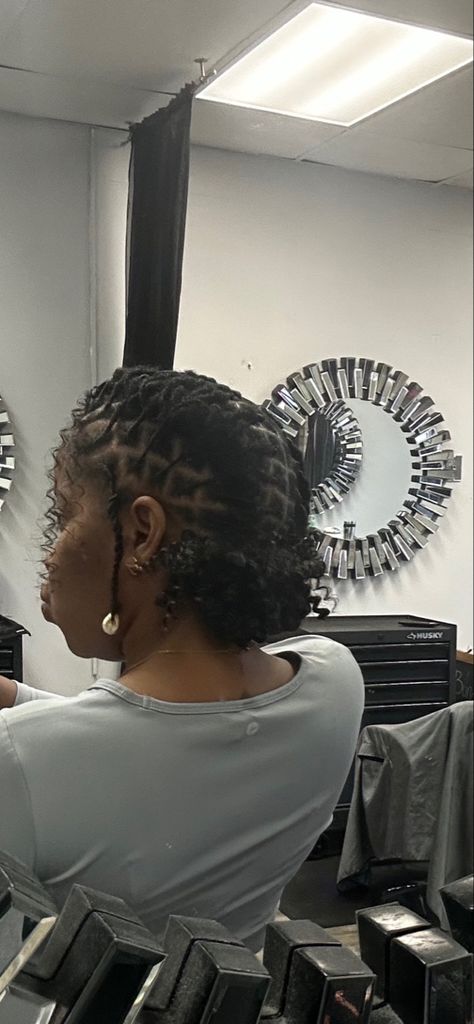 Barrel twist style with two strands hanging Female Barrel Twist, Barrel Twist With Curly Bun, Barrel Twist Loc Styles Women, Barrel Twists Locs Women, Two Barrel Twist Locs Women, Barrell Twist On Locs For Women, Barrel Twist Women, Locs Barrel Twist, Barrel Twist Styles