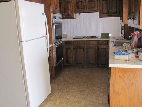 This 1978 kitchen needed an overhaul and, boy, did it get one! Faux Brick Backsplash, Bar Stool Makeover, Fixer Upper Kitchen, Faux Brick Panels, Farmhouse Style Bedrooms, Brick Paneling, Brick Backsplash, Oak Kitchen Cabinets, Apartment Makeover