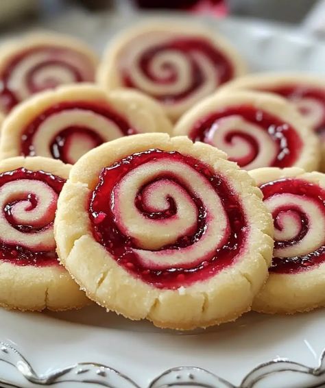 Raspberry Swirl Shortbread Cookies | Homemade Recipes Shortbread Swirl Cookies, Christmas Cookies Raspberry, Raspberry Christmas Cookies, Raspberry Swirl Cookies, Raspberry Swirl Shortbread Cookies, Shortbread Cookie Recipe Christmas, Raspberry Shortbread Cookies, Raspberry Shortbread, Christmas Shortbread Cookies