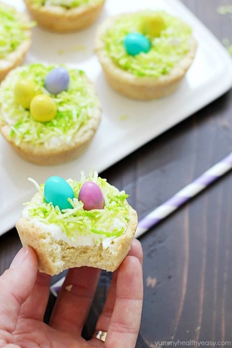 Need a fun treat to make for an Easter get together? Make these darling Easter Nest Sugar Cookie Cups! Sugar cookie dough cooked in a muffin tin, filled with vanilla frosting, topped with green tinted coconut and M&M eggs to look like a little bird's nest. So cute and great for spring! #truvia Cream Cheese Chicken Chili, Sugar Cookie Cups, Cookie Cups Recipe, Easter Nests, Easter Sugar Cookies, Easter Snacks, Cream Cheese Chicken, Sugar Cookie Dough, Cookie Cups