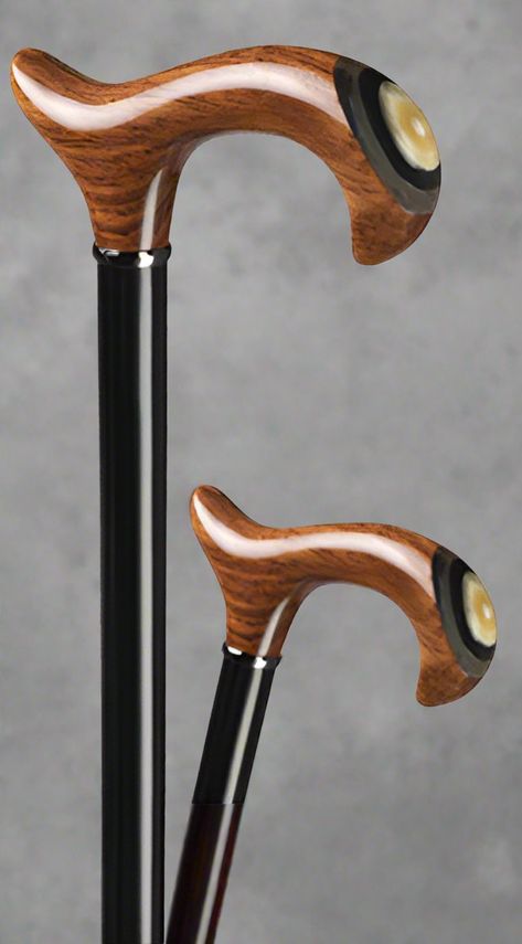 Jupiter Inlaid Men's Hardwood Derby Walking Cane - 36" Elevate your style and mobility with the Jupiter Inlaid Men's Hardwood Derby Walking Cane, available exclusively at Canes Galore. This exquisite 36-inch cane is crafted from high-quality hardwood and features a stunning inlaid design, making it a perfect blend of elegance and durability. Key Features: Beautiful Inlaid Design: The cane showcases an intricate inlaid pattern that adds a touch of sophistication and uniqueness to this classic acc Cool Walking Canes, Walking Canes Men, Hiking Staff, Wooden Walking Canes, Cane Handles, Walking Cane, Walking Canes, Walking Sticks, Derby