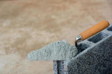 Cement powder or mortar with trowel put on the Concrete brick for construction work. Cement Powder, Concrete Bricks, Construction Work, Put On, Cement, For Free