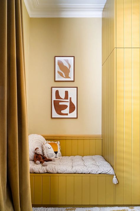 Love everything about this child's bedroom that does double duty as a playroom. Walls: Hay Below the chair rail and closet: India Yellow
Farrow & Ball sample pots available at Hirshfield's Edina and Roseville stores. In-store tinting at our Edina store.

Source: Olivia Lidbury/Domino Photographer: Leo Davut Yellow Kids Bedroom, Yellow Kids Rooms, London Bedroom, Design Hall, Bespoke Wardrobe, Built In Banquette, Yellow Walls, House Bed, London Design