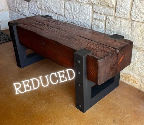 Hand Hewn Bench with a contemporay appeal. Made from solid douglas fir beams. Beams are 8" x 8" x 46.5" Stained with a Honey color Varathane stain and sealed with Varathane oil based clear coat. The legs are wood and painted flat black with metal grommets to give the legs a metal and contemporary look.  ... Free shipping still applies (Local only) Welding Furniture Projects, Douglas Fir Beams, Metal And Wood Bench, Varathane Stain, Rustic Industrial Furniture, Rustic Wooden Coffee Table, Live Edge Bench, Entryway Hall, Diy Furniture Videos