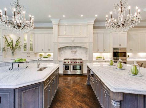 Beautiful kitchen with white cabinets two islands two chandeliers and Carrara marble countertops Calacatta Marble Kitchen, Gourmet Kitchen Design, Marble Kitchen Island, White Marble Kitchen, Beautiful Kitchen Designs, Dream Kitchens Design, Pretty Kitchen, White Kitchen Design, White Marble Countertops