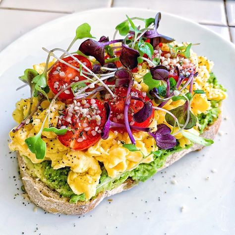 Avocado Toast on sourdough with my Creamy Kale Cashew Pesto topped with soft scrambled eggs, sweet grape tomatoes, hemp seeds, and micro… Creamy Food, Soft Scrambled Eggs, Cashew Pesto, Creamy Kale, Breakfast Eggs Scrambled, Scrambled Eggs With Spinach, Healthy Toast, Avocado Dessert, Avocado Health Benefits