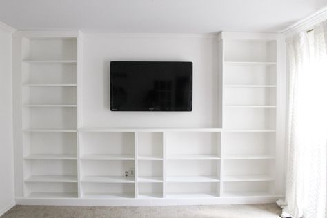 Complete a wall of built-ins on a budget by turning a set of IKEA Billy bookcases into a DIY set of built -ins. This is an IKEA hack you will want to see. https://www.arinsolangeathome.com #ikeahack #builtin Billy Ikea, Ikea Built In, Billy Bookcase Hack, Ikea Billy Bookcase Hack, Ikea Dresser, Ikea Living Room, Ikea Billy Bookcase, Ikea Billy, Billy Bookcase