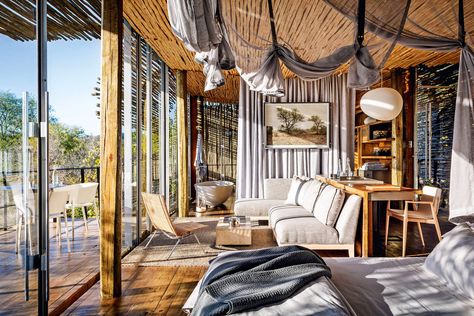 ‘I’m passionate about adventure travel and exploring the more remote parts of the world. At [link url="https://www.cntraveller.com/gallery/singita-boulders-lodge-south-africa"]Singita,[/link] I slept out on a balcony under a mosquito net – waking at sunrise to the sounds of the jungle was a grounding experience. Out on safari here, I encountered wildlife that I’ll never forget; lions, elephants, leopards, rhinos, giraffes and hippos. People tell me that I can be demanding, but the staff at Sing Romantic Hotel Rooms, Luxe Lodge, Luxury Safari Lodge, Glamping Resorts, Rustic Luxe, Okavango Delta, Luxury Safari, Luxury Lodge, Safari Lodge