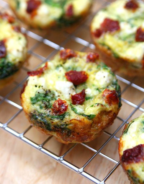 Spinach, Feta and Sun-Dried Tomato Egg Muffin Cups - A perfect make-ahead breakfast full of flavor. They're easy to make and only 50 calories in each cup. Muffin Cups Recipes, Egg Muffin Cups, Tomato And Feta, Tomato Egg, Egg Muffin, Spinach Feta, Spinach Egg, Breakfast Wraps, Egg Muffins