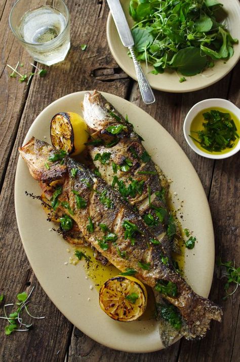 You know that whole branzino you see on every fancy menu? It’s pretty easy to prepare at home. Whole Trout Recipes, Branzino Recipe, Baked Whole Fish, Whole Fish Recipes, Roast Fish, Fish Restaurant, Trout Recipes, Plats Healthy, Fish Dishes