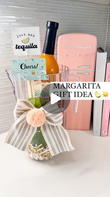 Shelby | Gift-in-a-Box Guide on Instagram: "We love a loophole 👏🏼  This “Just Add Tequila” gift makes the perfect unique Teacher Appreciation gift idea - OR a hostess gift, closing gift, birthday gift etc this summer   Put your favorite margarita making ingredients in a pitcher, add a gift card for them to pick out their liquor of choice and voilà  *Comment SUPPLIES for everything I used to put this gift together 🍋‍🟩☀️  #diy #teacherappreciationweek #teacherappreciation #giftcardholder #diygifts #diygift #giftbaskets #giftbasket #margarita #teachergift #teachergifts #teachergiftideas #momdiy #howto #teachersofinstagram #teachersofinsta #targetfinds" Margarita Christmas Gift, Wine For Teachers Gift, Margarita Teacher Gift, Gifts For Margarita Lovers, Pitcher Gift Basket Ideas, Margarita Gift Basket Ideas Diy, Diy Margarita Gift Basket, Margarita Basket Ideas Gift, Margarita Gift Ideas