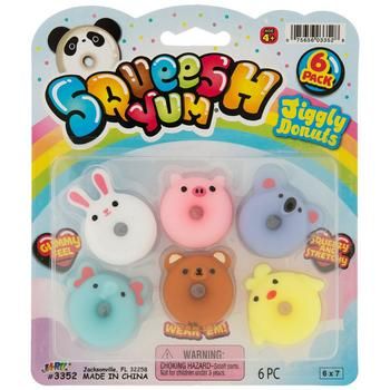 Dimensions: 	 Length: 1 1/4" - 1 3/4" 	 Width: 1 1/4" - 1 5/8" 	 Thickness: 1/2" Package contains 6 sensory toys. Squeesh Yum Jiggly Donuts Sensory Toys are delectably cute and fun to squish! These soft, engaging toys are shaped like small donuts and feature animal motifs, such as a rabbit, a koala, a baby chick, and more. Thanks to their gummy feel, they can be squeezed, stretched, and even worn as rings on your fingers! Figets Toys, Diy Sensory Toys, Colorful Donuts, Squishy Toys, Cool Fidget Toys, Cute Squishies, Baby Chick, Animal Motifs, Diy Projects Videos