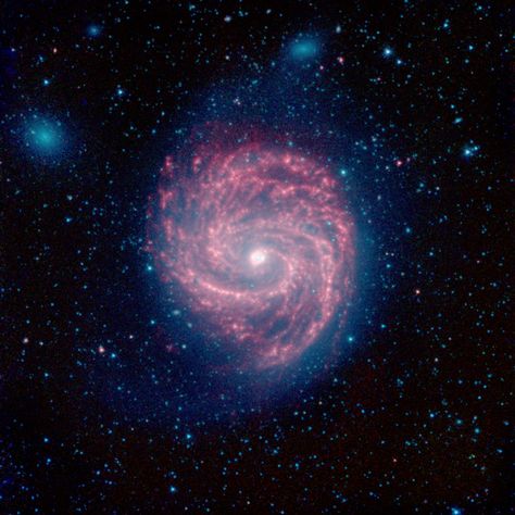 This infrared image, from NASA's Spitzer Space Telescope, of M100 is a classic example of a grand design spiral galaxy, with prominent and well-defined spiral arms winding from the hot center, out to the cooler edges of the galaxy. Spitzer Space Telescope, California Institute Of Technology, Spiral Galaxy, Milky Way Galaxy, The Solar System, Space Telescope, Light Year, Grand Designs, Science Center