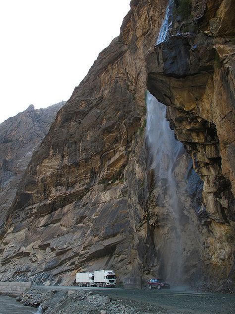 Waterfall washing all cars and trucks passing by a mountain road, Pamir Mountains, Tajikistan Beautiful Pathways, Pamir Mountains, Majestic Nature, Tian Shan, Mountain Roads, Mountain Love, Dangerous Roads, Landlocked Country, Mountain Road