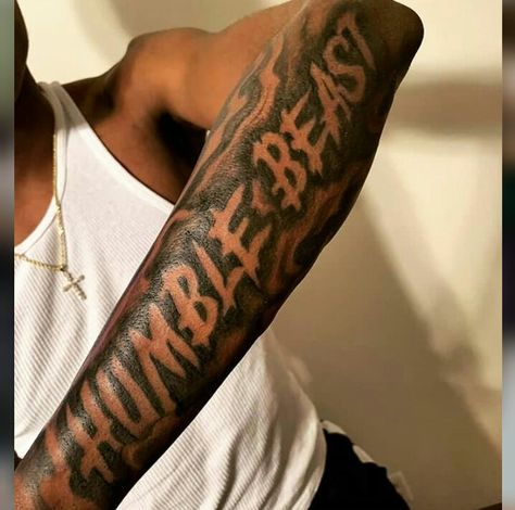 Bicep Tattoo Men Black, Chosen One Tattoo Men Forearm, Humble Beast Tattoo Men Forearm, Consistency Is Key Tattoo, Back Of Forearm Tattoo Men Sleeve, Top Sleeve Tattoo For Men, Forarm Tattoos For Man Sleeve, Black Men Arm Tattoos Sleeve, Arm Tattoo Men Forearm Black