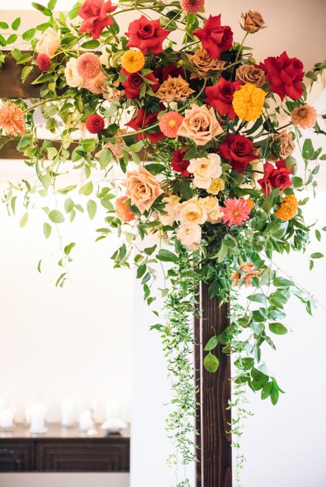 Red Orange Yellow Floral Arrangement, Red Orange Yellow Flowers, Colorful Chuppah Flowers, Yellow Red Wedding, Chuppah Flowers, Orange Wedding Decorations, California Flowers, Pew Flowers, Mantel Piece