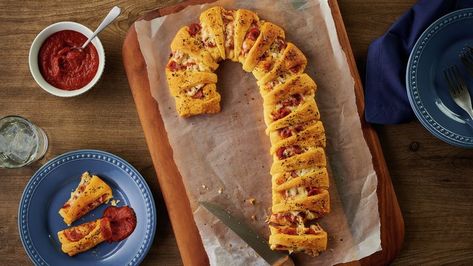 Pizza Crescent Candy Cane Recipe - Pillsbury.com Crescent Pizza Recipes, Crescent Pizza, Fast Snacks, Pillsbury Crescent Rolls, Candy Cane Recipe, Crescent Roll Pizza, Holiday Party Appetizers, Pillsbury Crescent, Crescent Recipes