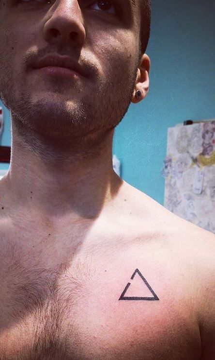 Chest tattoos for men are very popular nowadays. #tattoos Men’s Simple Chest Tattoos, Triangle Chest Tattoo, Small Chest Tattoos For Guys, Small Chest Tattoo Men, Dark Tattoos For Men, Small Tattoo Ideas For Men, Chest Tattoos For Men, Under Chest Tattoo, Small Chest Tattoos