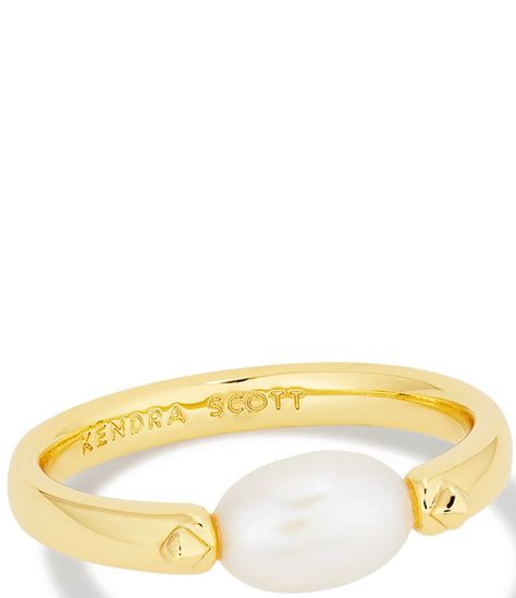 From Kendra Scott, this 14K ring features: 14K Gold plated or rhodium plated over brass Approx. 0.19'' WImported. Kendra Scott Ring On Hand, Kendra Scott Pearl Ring, Promise Rings Pearl, Gold Jewelry White Background, Wwjd Ring, Puravida Rings, Cute Gold Rings, Kendra Scott Rings, Gold Jewlry