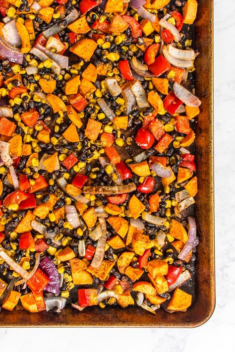 This sheet pan meal of sweet potato and black bean hash can be dinner on its own, but you can also use it to make a variety of other vegan meals. Sweet Potato Black Bean Recipe, Sweet Potato Burrito, Black Bean Casserole, Sweet Potato And Black Bean, Black Bean Recipes, Sweet Potato Black Beans, Sweet Potato Hash, Vegan Sweet Potato, Tasty Vegetarian Recipes