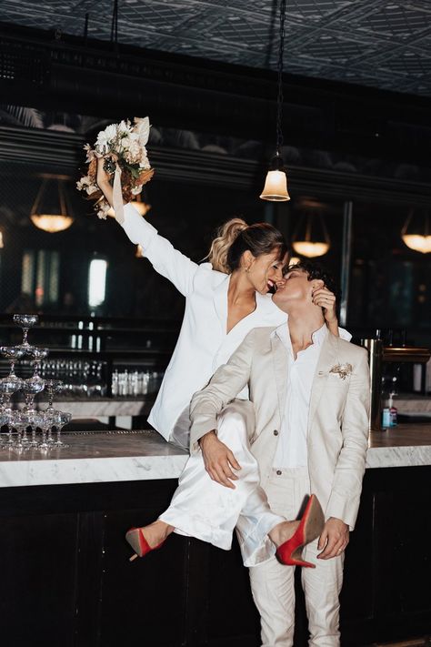 Wedding Couple Popping Champagne, Cityscape Wedding Photos, Flash Photo Engagement Shoot, Courthouse Elopement Ideas, Bar Wedding Pictures, Boss Couple Photoshoot, Wedding Bar Photoshoot, Old Fashion Engagement Photos, City Wedding Pictures