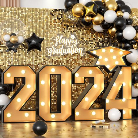 PRICES MAY VARY. 🎓 Assembly Required - You will get a perfect set of 2024 graduation party decorations, our black gold 2.3 feet marquee numbers 2024 includes: Pre-cut Foam Board "2-0-2-4" "graduate cap", Side Wall Panels, back support panel, 5 strings of bulbs and instruction manual (Powered by 3 AA batteries), Instruction Manual and Double Sided Tape. In addition, you need to prepare glue guns and batteries in advance.(note: glue guns and batteries are not included) 🎓 Premium Foam Board - The Graduation Party Orange And Black, Glitz And Glam Graduation Party, Black And Gold Graduation Party Decorations, Graduation Party Ideas Gold And Black, Black Gold Graduation Party Ideas, Graduation Set Up Ideas, Graduation Party Set Up, Marquee Numbers With Lights, Black And Gold Graduation Party Ideas